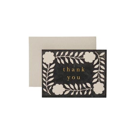 A black mini 'Thank You' card with gold foil text and floral designs, accompanied by a pale grey envelope.