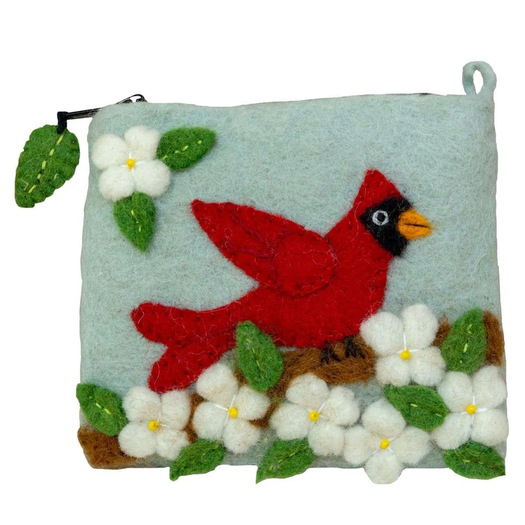 Felted pouch with a red cardinal and flowers on a light blue background