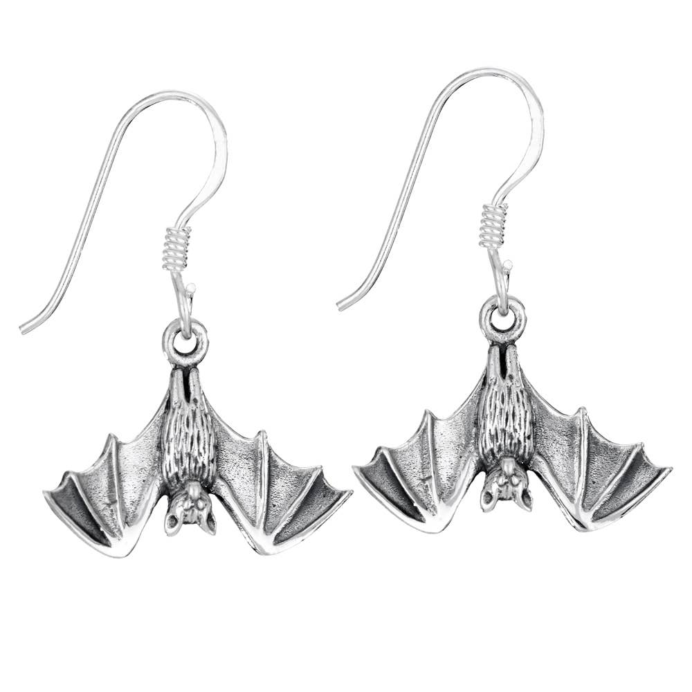 Silver bat earrings on a white background
