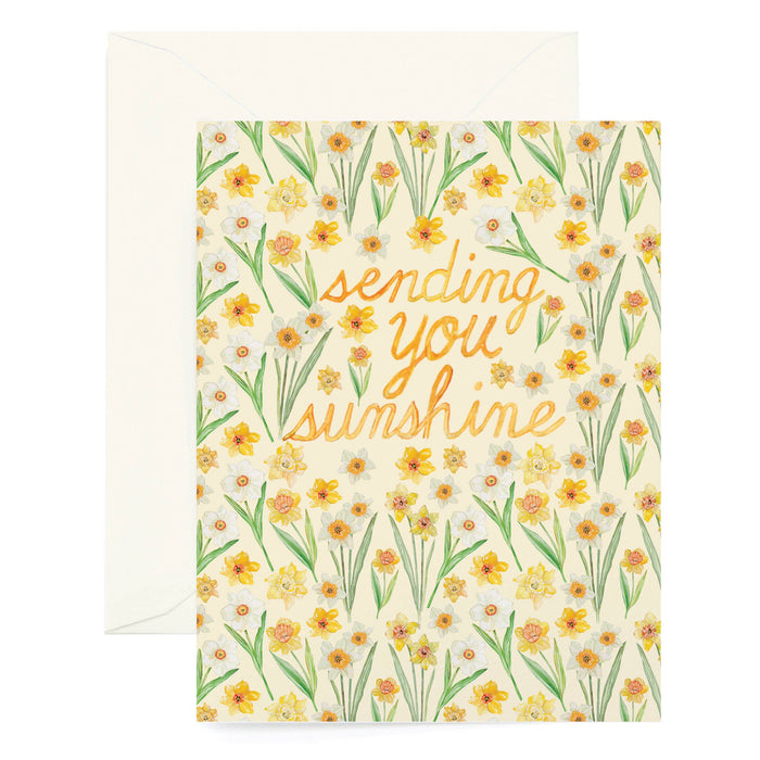 Greeting card with floral design and 'sending you sunshine' text on a white background