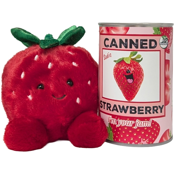 Plush strawberry toy next to a can of 'Canned Strawberry' with a smiling strawberry on the label.