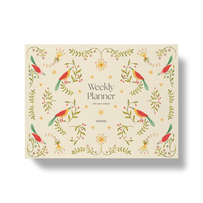 Weekly planner with bird and floral design on a beige background