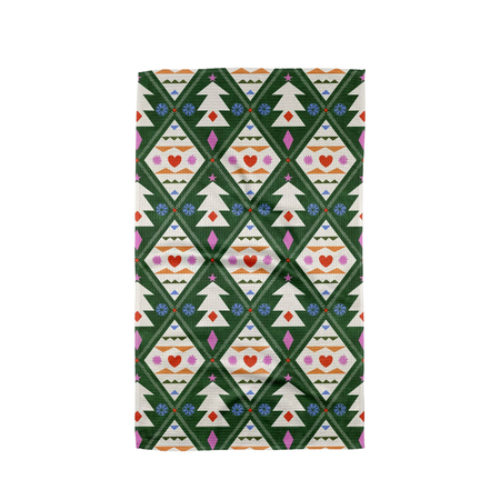 Patterned fabric with Christmas tree design on a green background