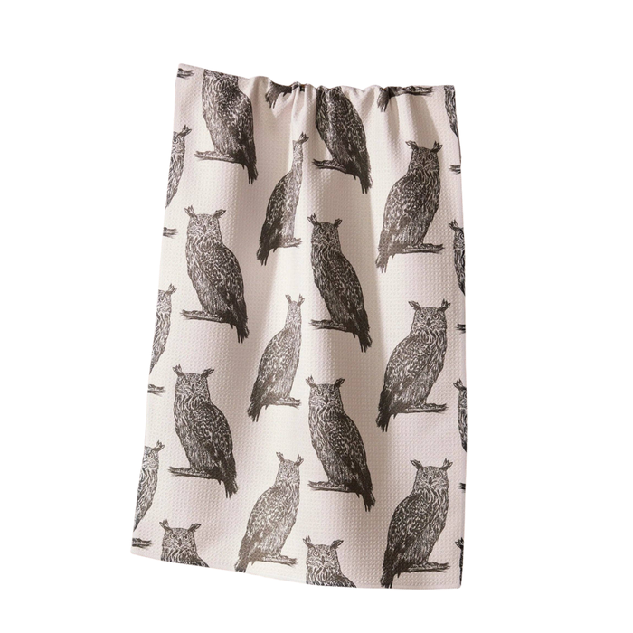 towel with black owl pattern on a white background