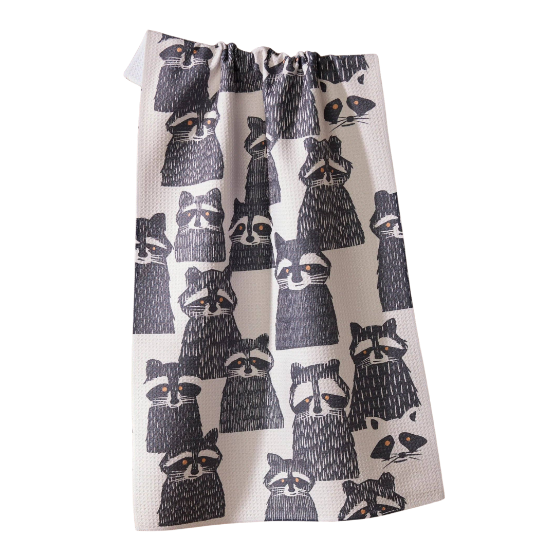 towel with raccoon pattern on a white background