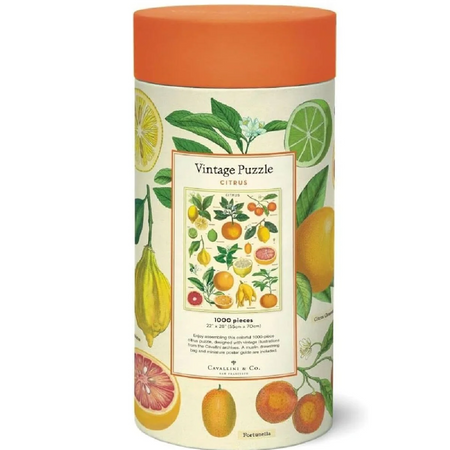  cylindrical puzzle box with fruit illustrations and an orange lid