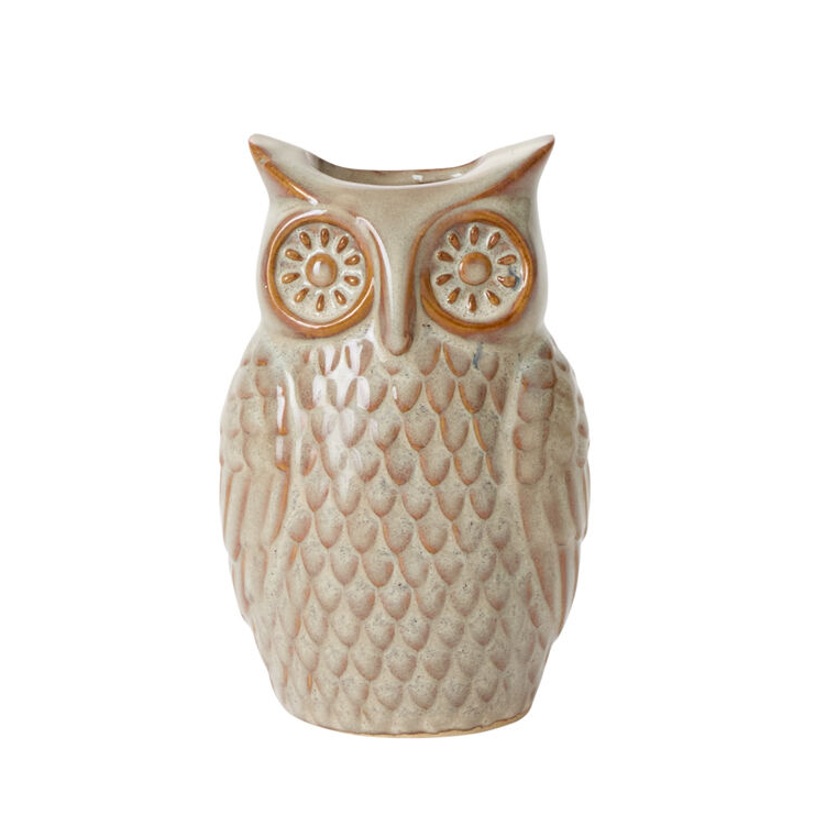Ceramic owl-shaped vase on a white background