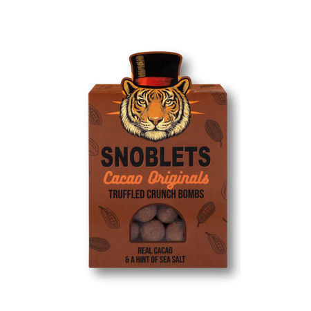 Box of Snoblets Cacao Originals truffled crunch bombs with a tiger design on the packaging.