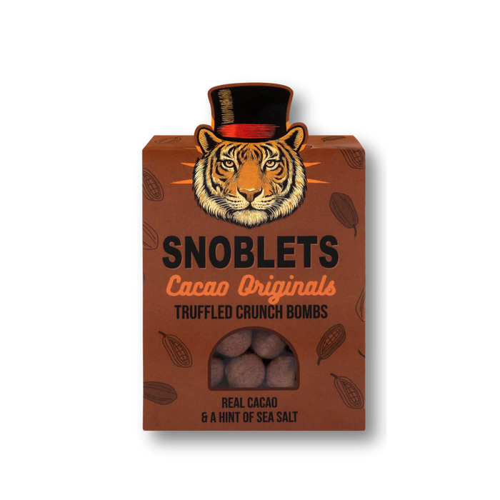 Box of Snoblets Cacao Originals truffled crunch bombs with a tiger design on the packaging.