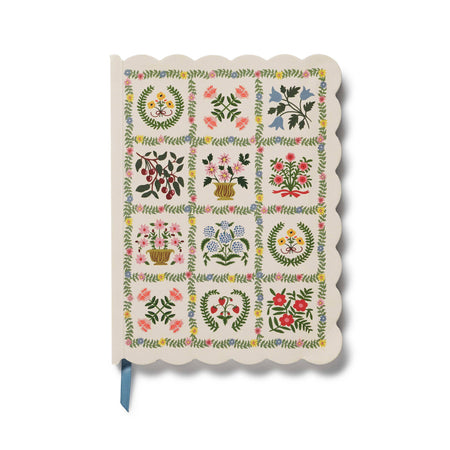 Notebook with floral and geometric pattern on a white background