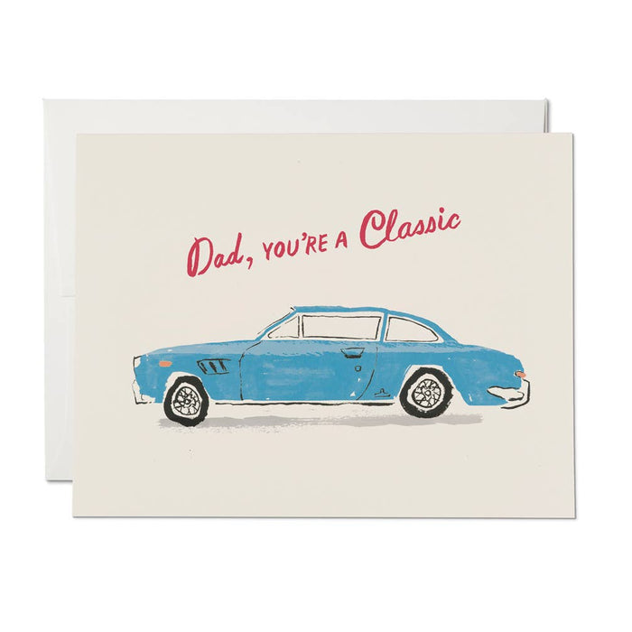 Greeting card with a blue car illustration and text 'Dad, you're a classic' on a white background