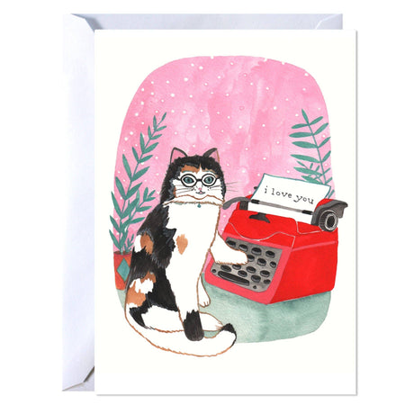 Greeting card with a cat and typewriter illustration on a pink background