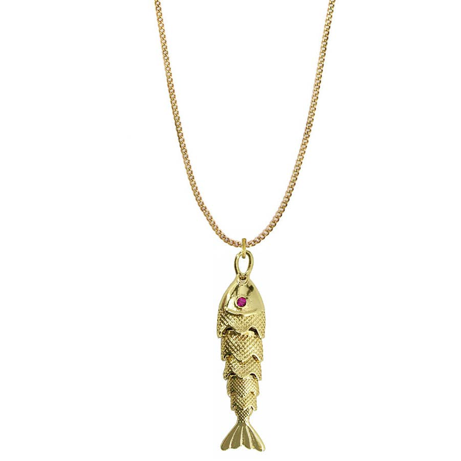 Gold fish-shaped pendant with a red gemstone on a chain against a white background
