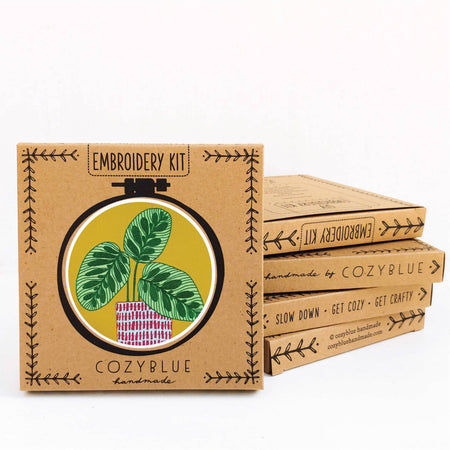 CozyBlue embroidery kit packaging with plant illustration on a white background