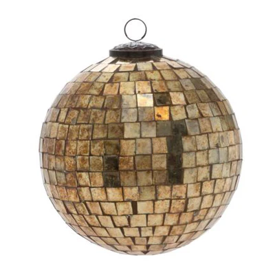 Decorative disco ball ornament with antiqued glass on a white background
