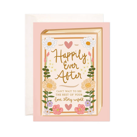 Greeting card with 'Happily Ever After' text and floral design on a pink background