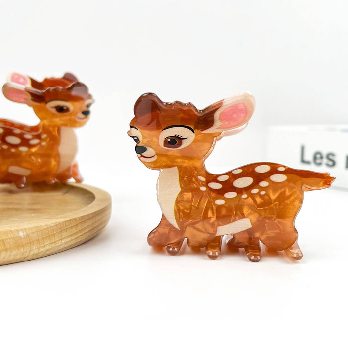 deer hair clips with white spots on a white background