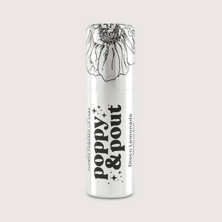 A white cylindrical lip balm tube with black text reading 'poppy & pout' and 'Flower Powered Lip Balm' and 'Disco Lemonade'. The top of the tube features a black line-art illustration of a flower.