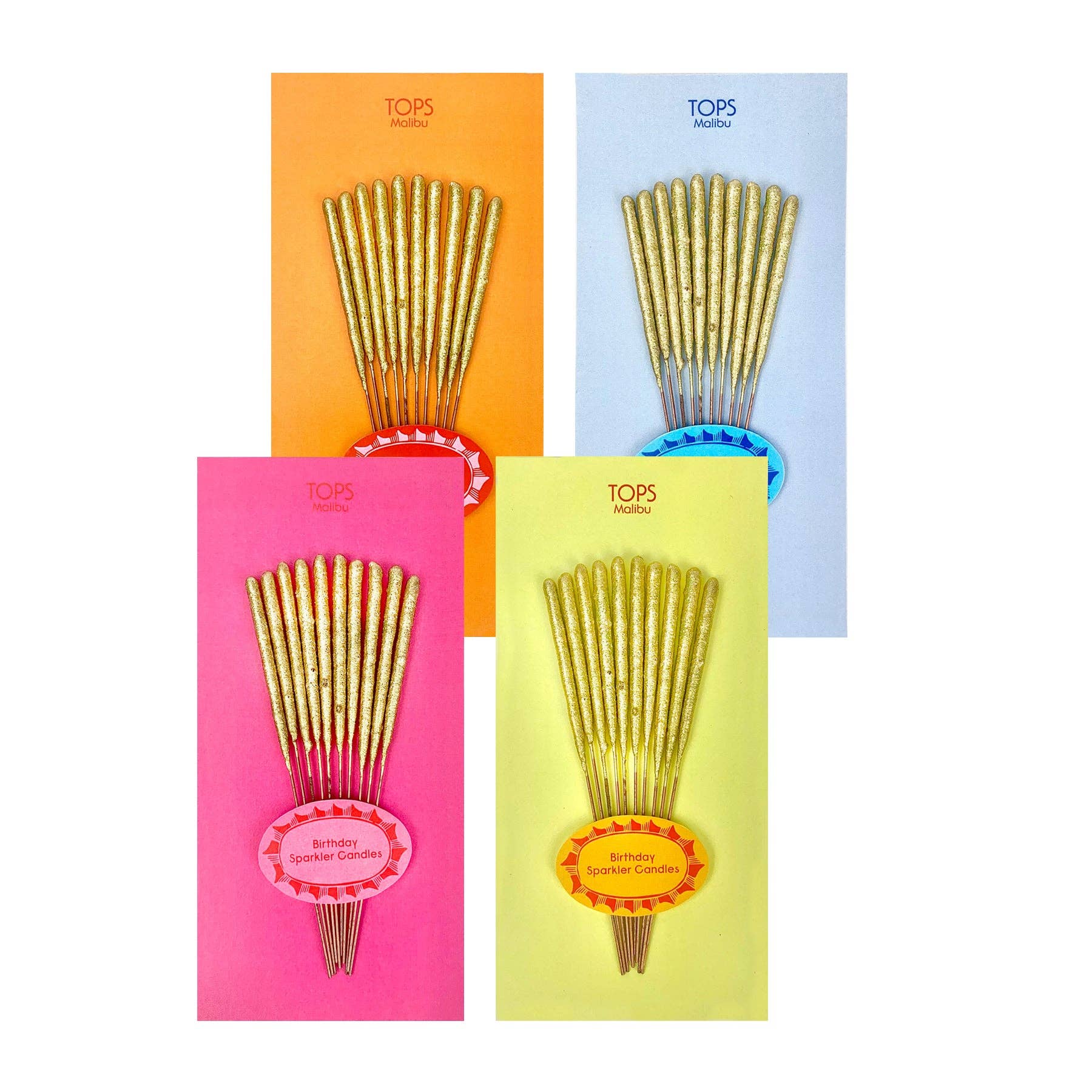 Set of four packages of gold birthday sparkler candles with colorful labels on a white background.