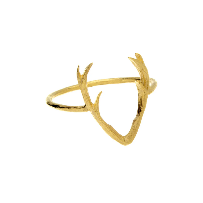 Gold antler-shaped ring on a white background