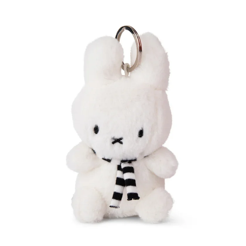 White plush Miffy bunny keychain wearing a black-and-white striped scarf with a silver key ring.