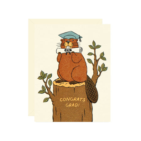 Graduation-themed greeting card with a beaver on a tree stump, holding a diploma, and the text 'Congrats Grad!'