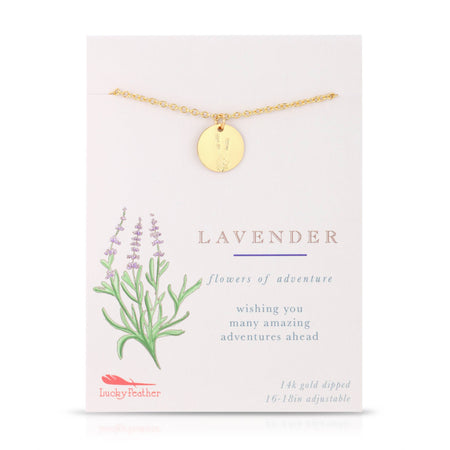 Gold necklace on a card with lavender illustration and text