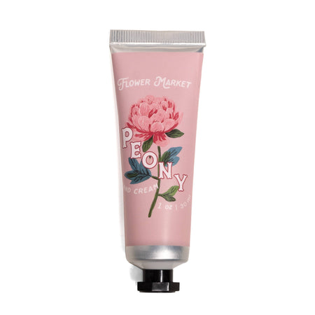 A squeeze tube of Flower Market Peony Hand Cream on a solid white background. The tube is light pink with a detailed illustration of a pink peony flower and green leaves, with the brand and product name printed on the front.