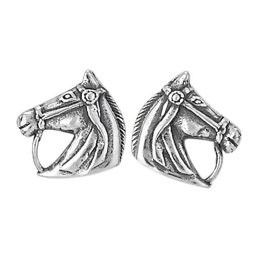 Pair of silver horse head earrings on a white background