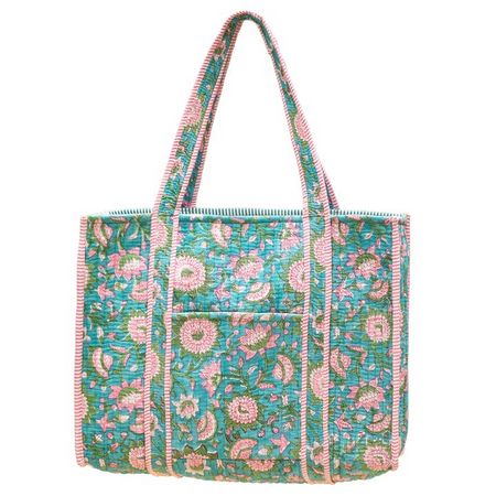 Floral patterned tote bag with pink and green accents on a white background