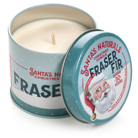 Candle in a tin labeled 'Santa's Naturals Fraser Fir' with a festive design.