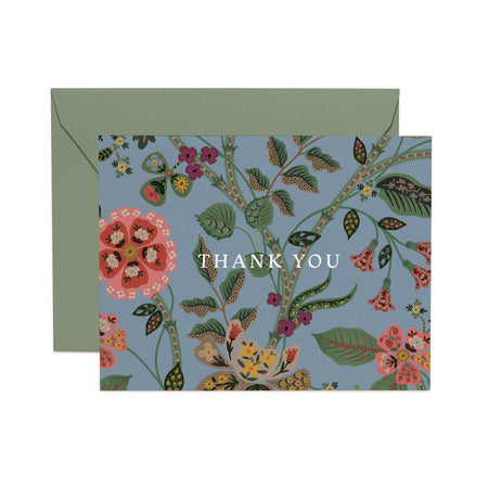 Floral card with 'Thank You' text and matching envelope on a white background