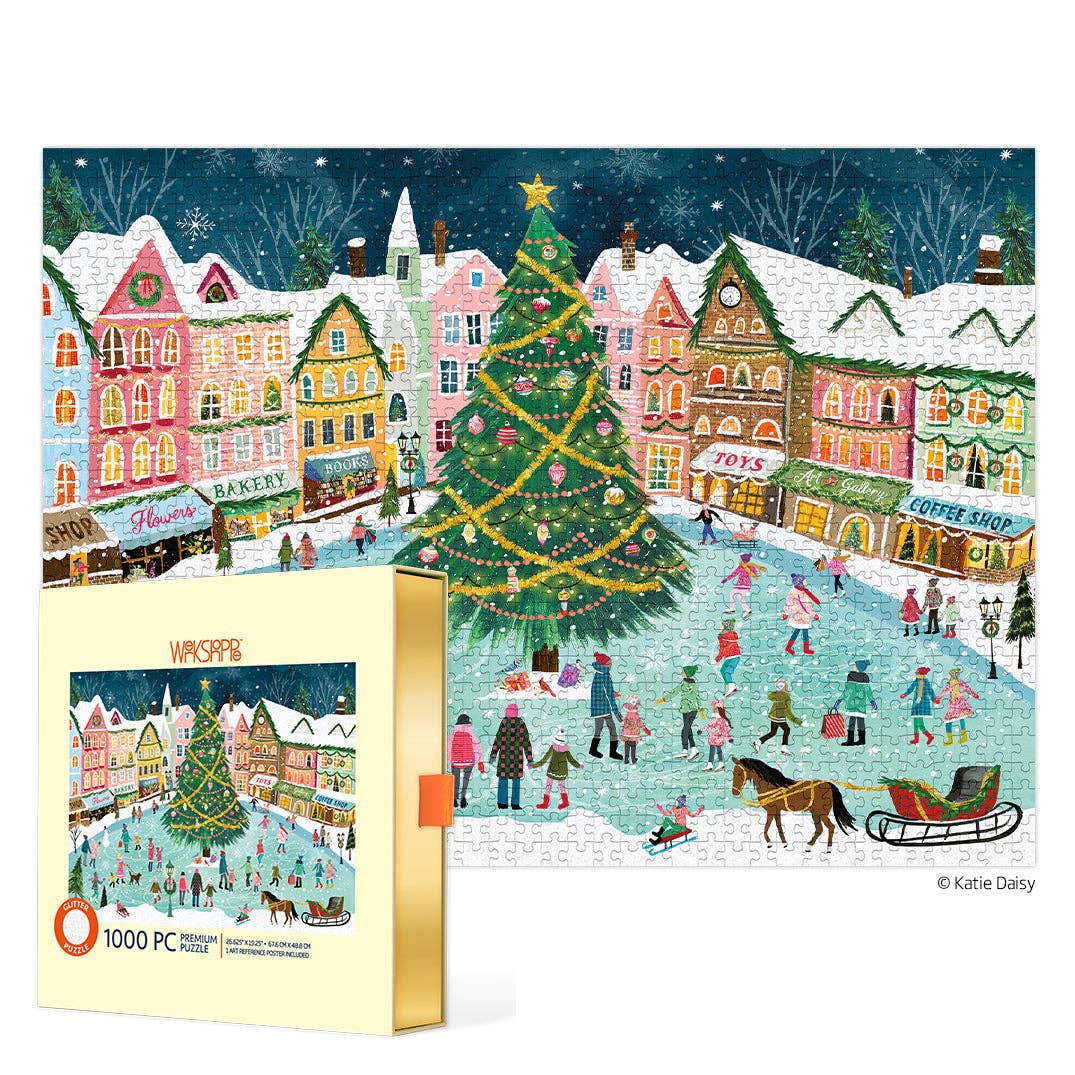 Jigsaw puzzle box with a festive village scene featuring a Christmas tree and people on a snowy street.
