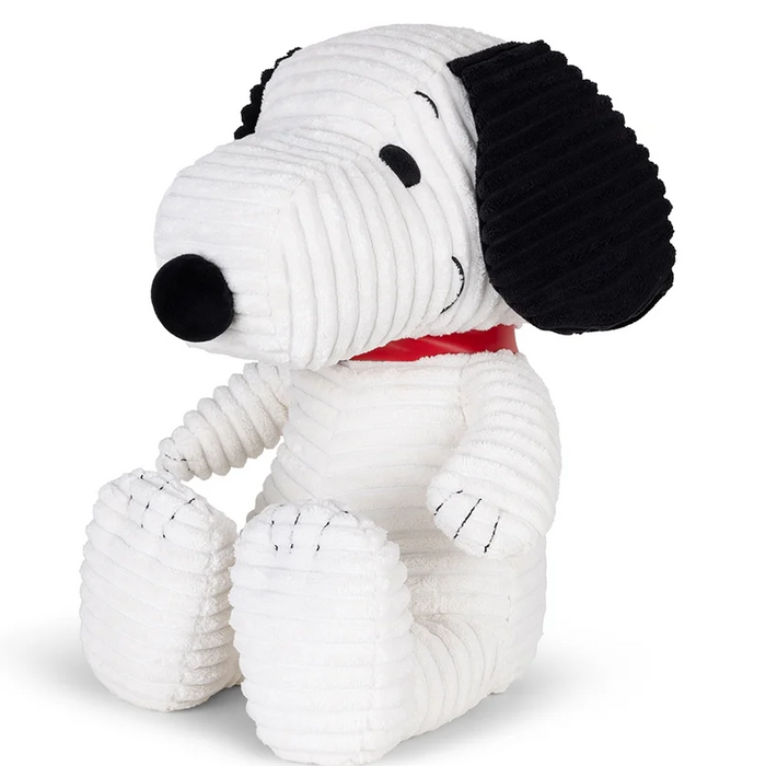 Cream corduroy Snoopy plush seated with black ears, a black nose, and a red collar