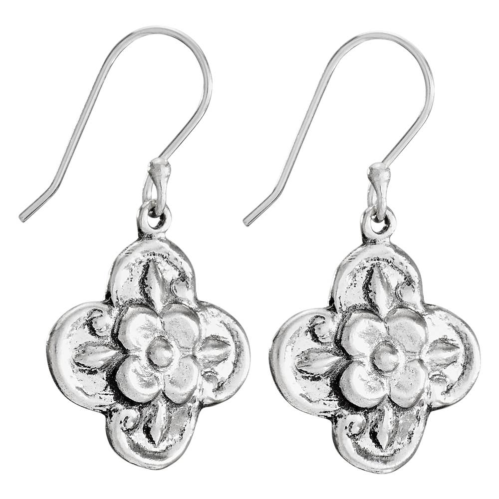 Silver floral earrings on a white background