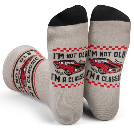 Gray socks with red and black graphics and text on a white background