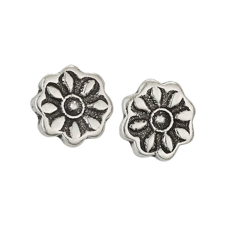 Pair of silver floral earrings on a white background