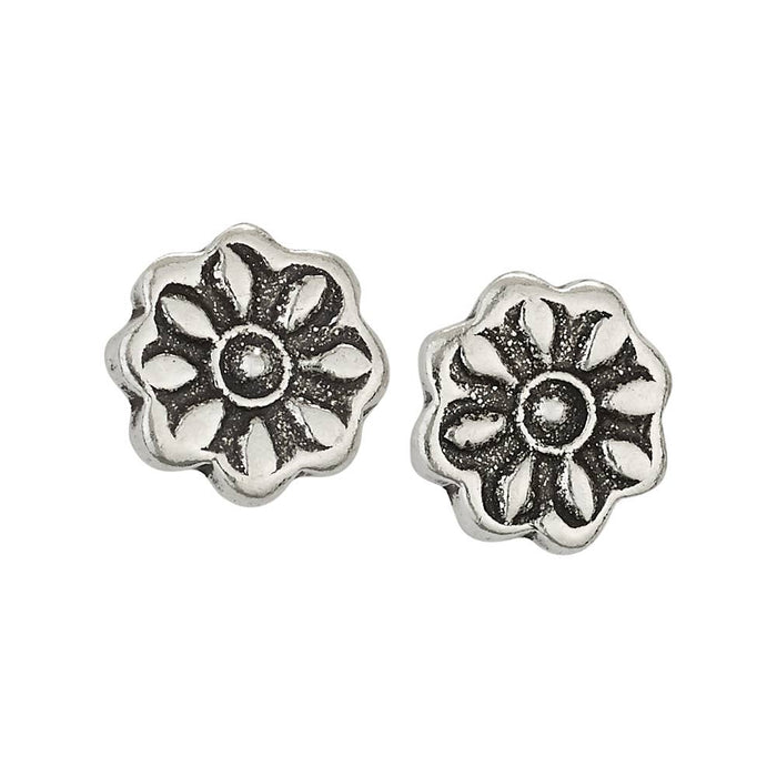 Pair of silver floral earrings on a white background