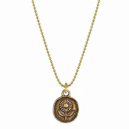 Necklace with a gold chain and bronze pendant featuring a floral design on a white background