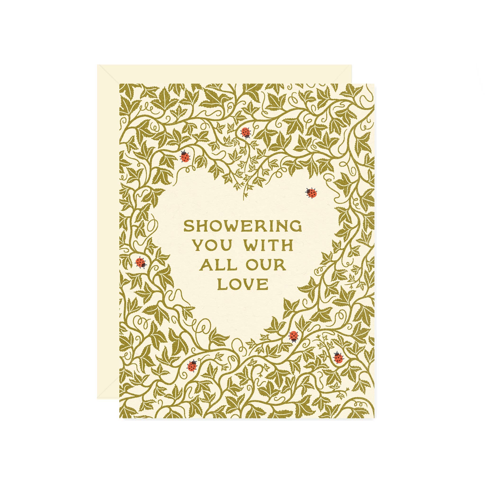 Greeting card with decorative gold pattern and text 'Showering you with all our love' on a white background