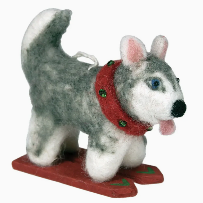 Felted dog ornament with a red collar on a white background