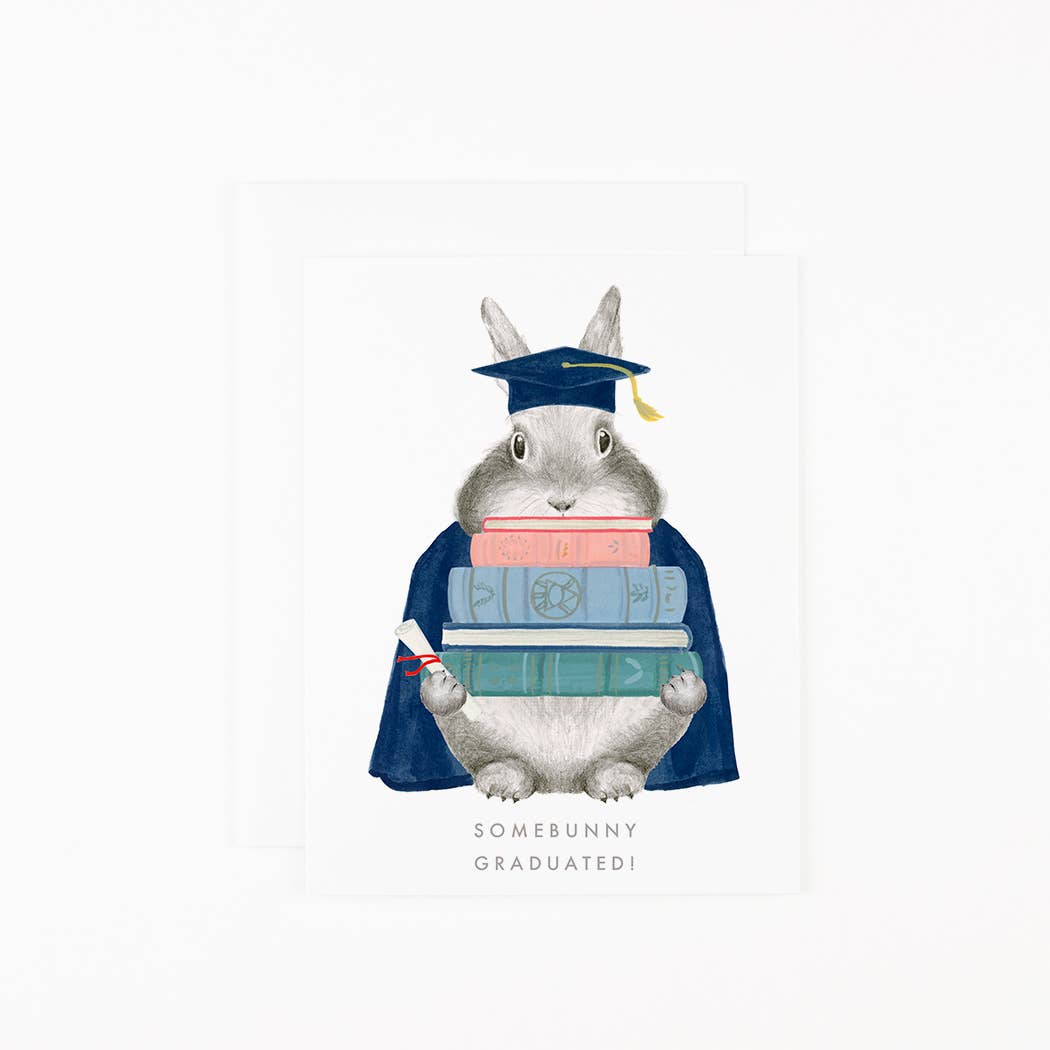 Illustration of a rabbit in a graduation gown and cap with books, on a white background.