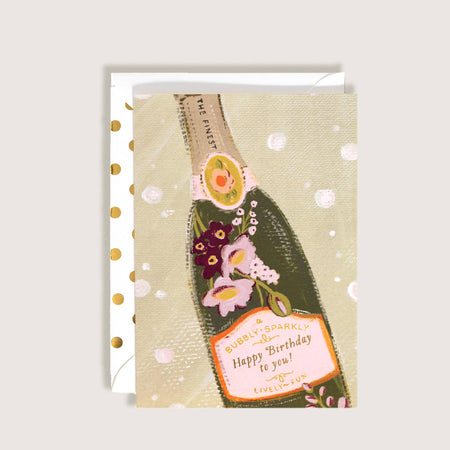 Greeting card with a bottle of champagne design and floral elements on a light background