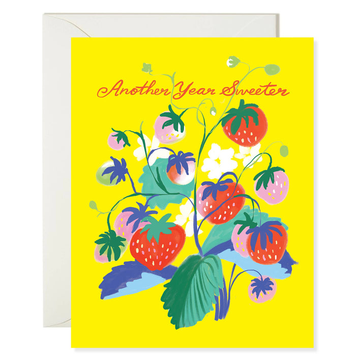 Greeting card with strawberry design and text on a yellow background