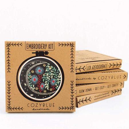 Embroidery kit packaging with CozyBlue branding on a white background