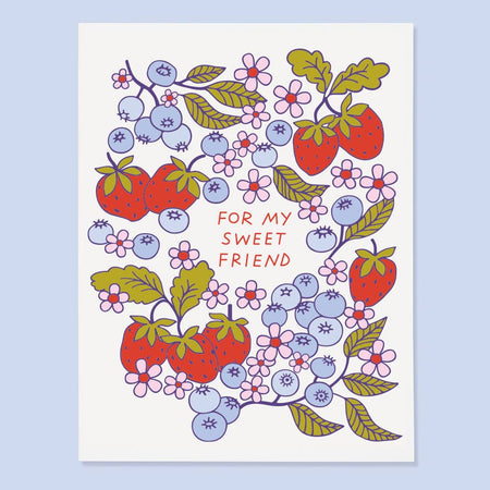 Card with strawberry and blueberry design and text 'For my sweet friend' on a light blue background
