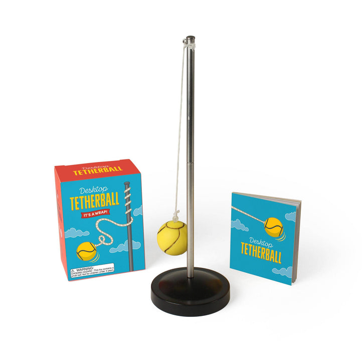 Desktop tetherball set with stand and packaging on a white background