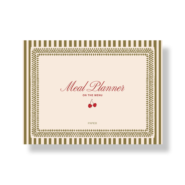 Meal planner book with decorative cover featuring a pair of cherries on a white background