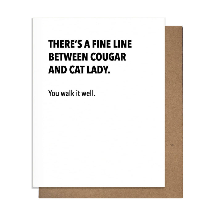 Card with humorous text about being a cougar or cat lady on a white background with brown border