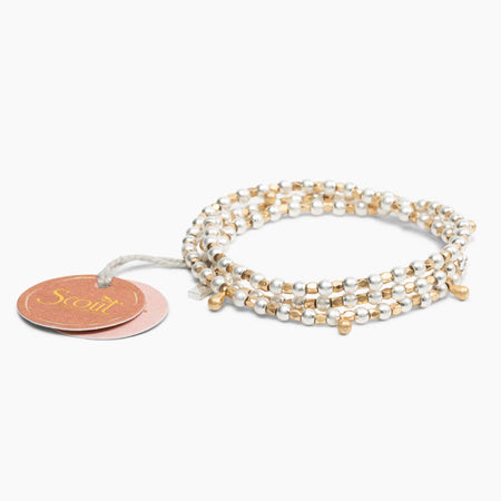 beaded bracelet/Wrap with a Scout tag on a white background